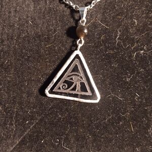 Black stained glass eye of Horus pendant